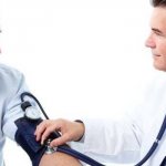 Doctor measuring a man&#39;s blood pressure